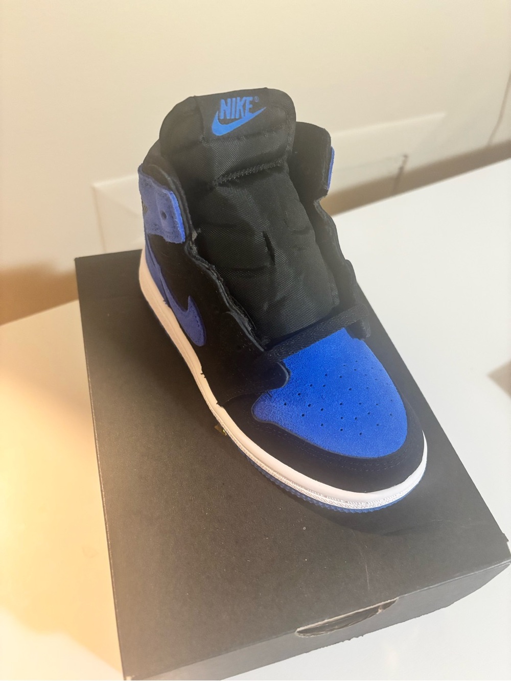 Nike Kids High-Top Sneakers in Black and Royal Blue